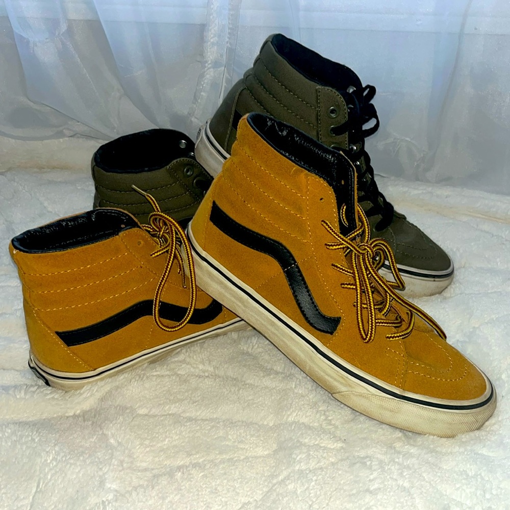 TWO pair of high top VANS, both in good condition.